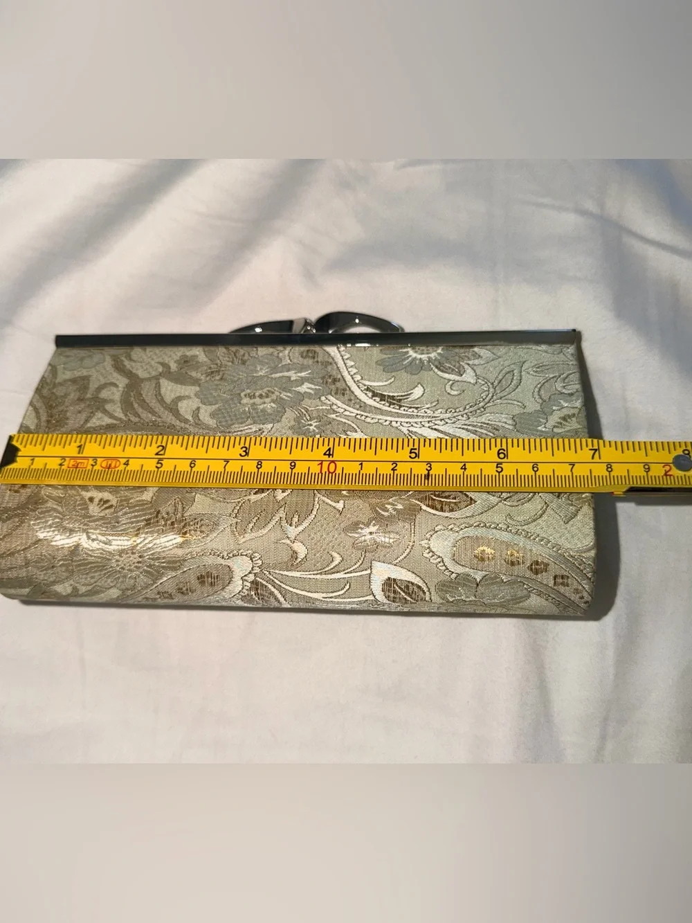 Viintage-style evening clutch features gold/green floral damask metal kiss lock